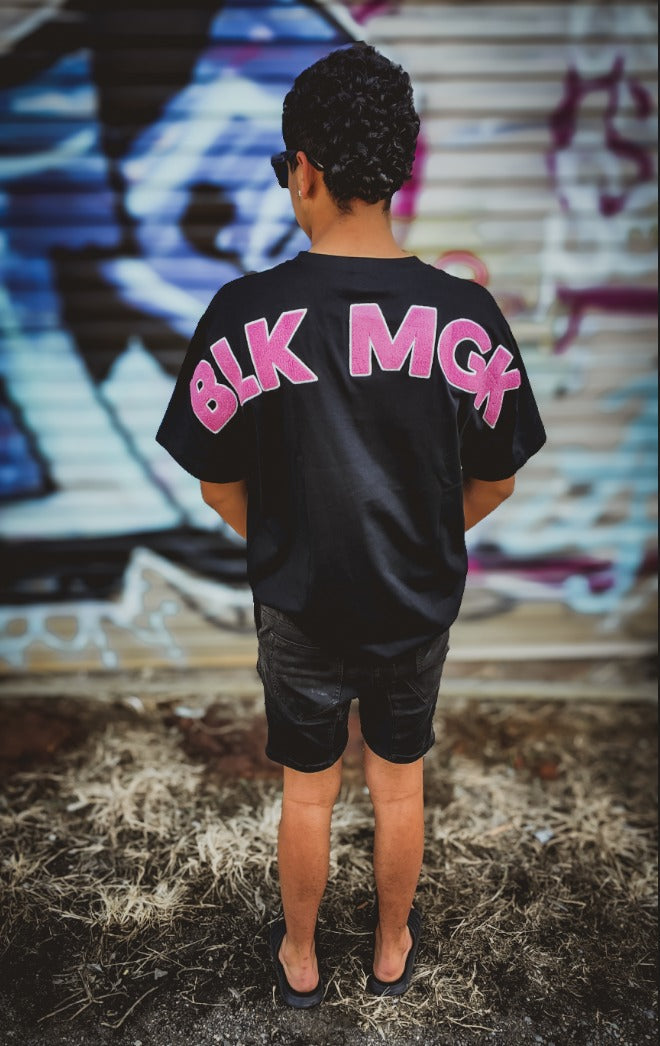 BLK MGK Heavy Tee Pink worn, back view