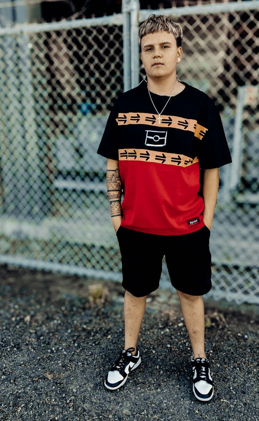 Young man wearing the Ngurrbul Heavy two-tone box cut tee
