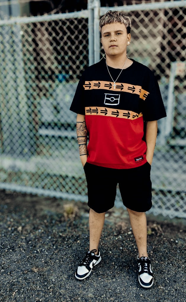 Young man wearing the Ngurrbul Heavy two-tone box cut tee